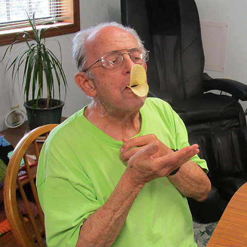 Man with duck lips made of potato chips
